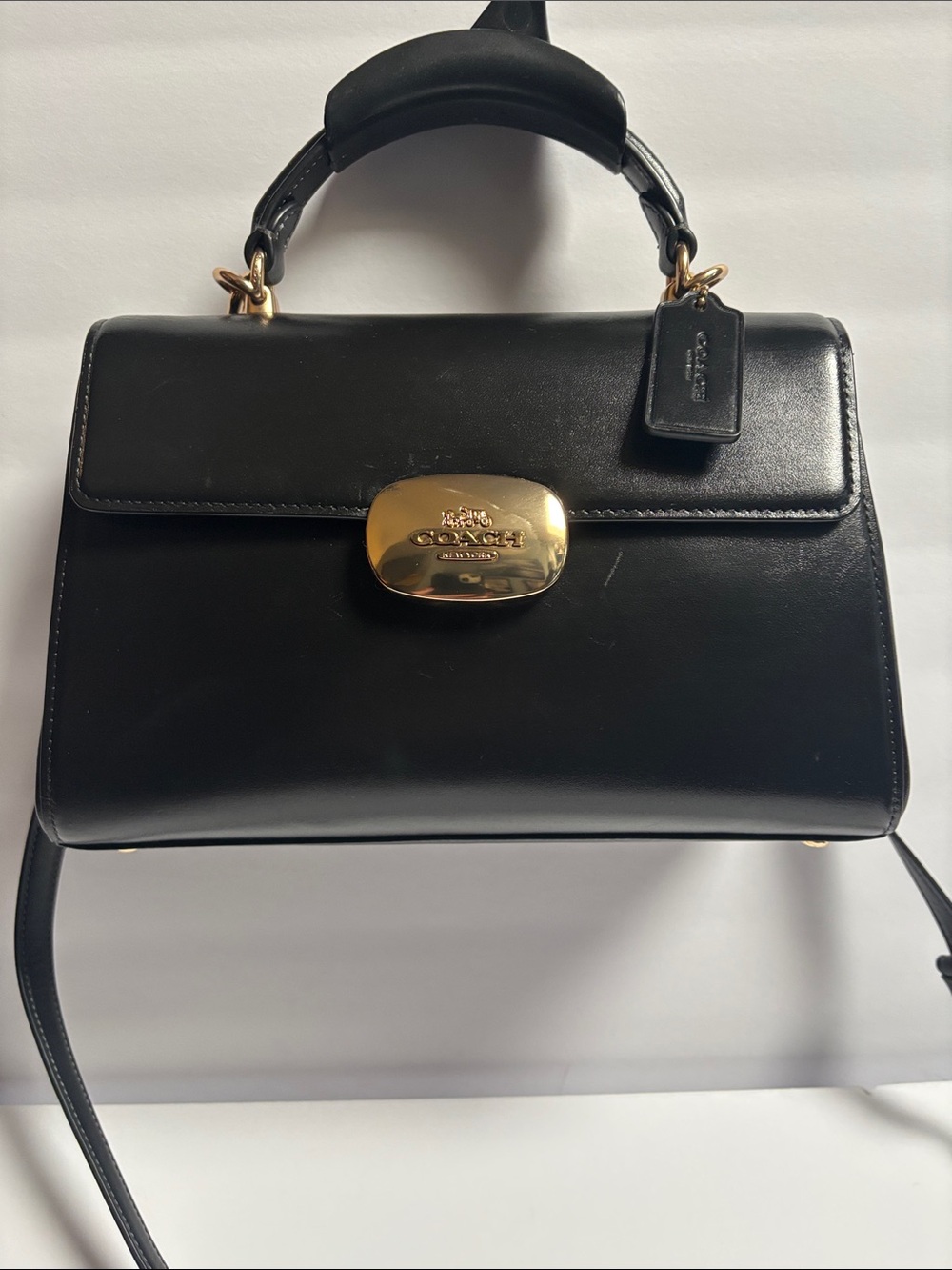 Coach Black Leather Top-Handle Satchel with Gold Hardware Accent